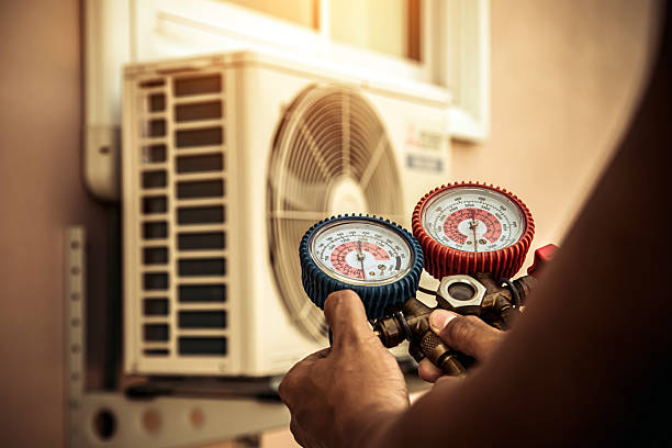 Professional Air Conditioning Service technician working in Avalon, TX